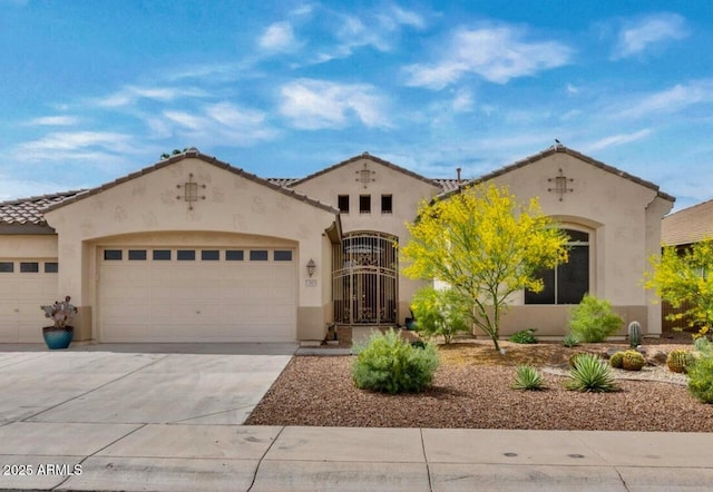 mediterranean / spanish-style home featuring a garage