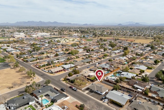 bird's eye view with a residential view and a mountain view