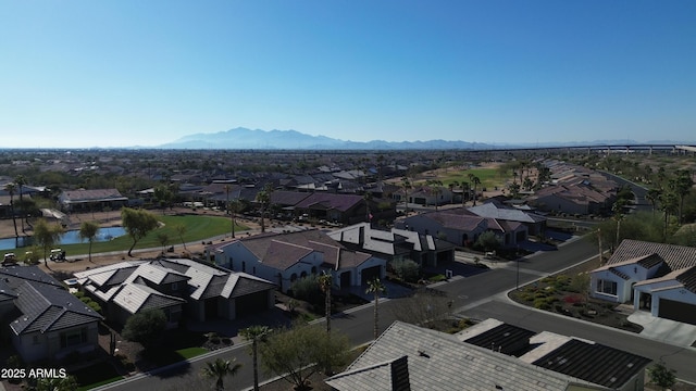 aerial view with a residential view and a water and mountain view