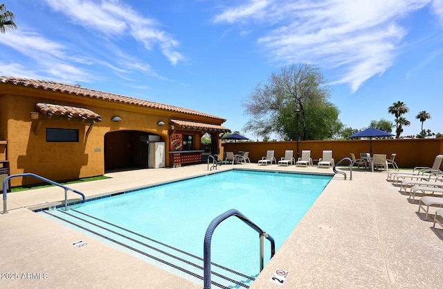 pool featuring a patio