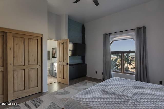 bedroom with dark wood-type flooring and ceiling fan