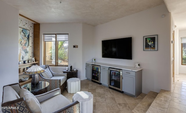 living room featuring bar and beverage cooler