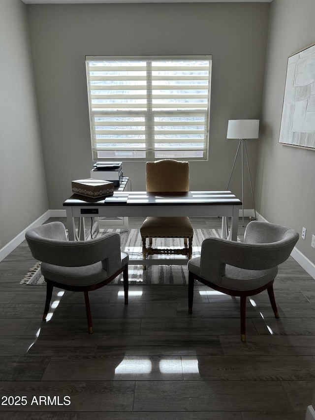 office area with baseboards and dark wood-style flooring