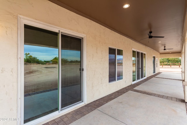 view of patio with ceiling fan