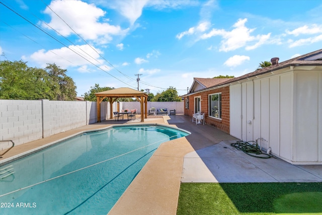 view of pool with a gazebo and a patio area