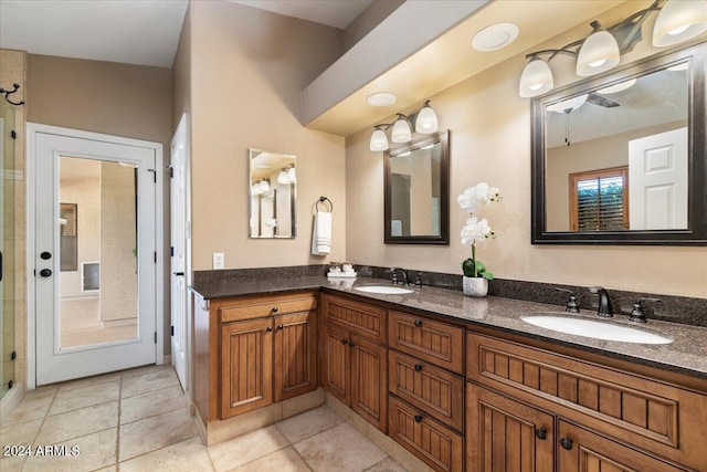 bathroom with vanity and tile patterned floors