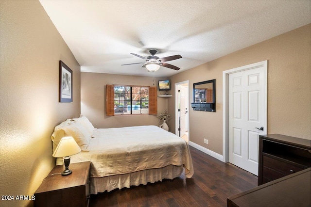 bedroom featuring dark hardwood / wood-style floors and ceiling fan