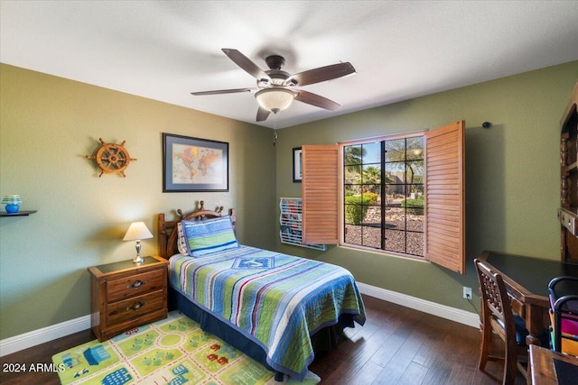 bedroom featuring hardwood / wood-style floors and ceiling fan