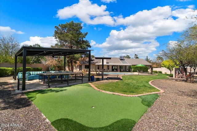 surrounding community with an outdoor hangout area