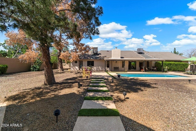 view of pool featuring a patio