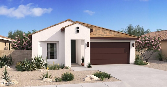 view of front of property with a garage