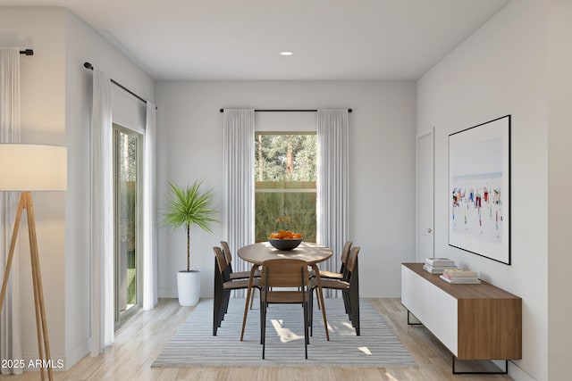 dining room with light wood-type flooring