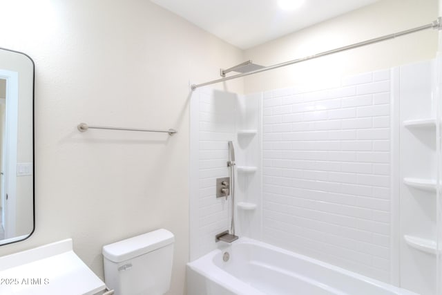 bathroom featuring bathtub / shower combination and toilet