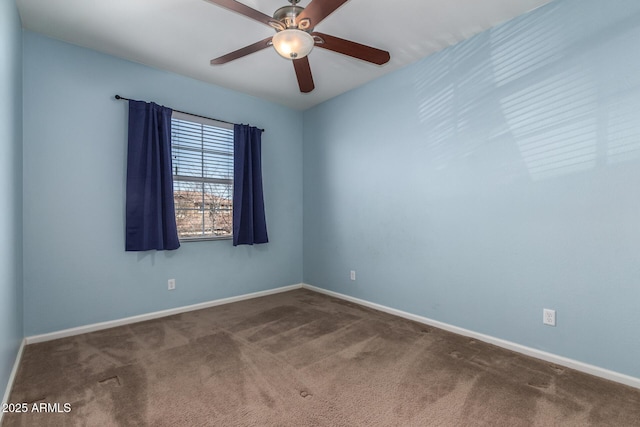 carpeted empty room with ceiling fan