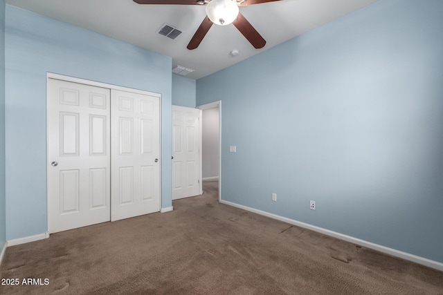 unfurnished bedroom featuring a closet, ceiling fan, and carpet flooring