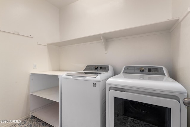 laundry room with washer and clothes dryer