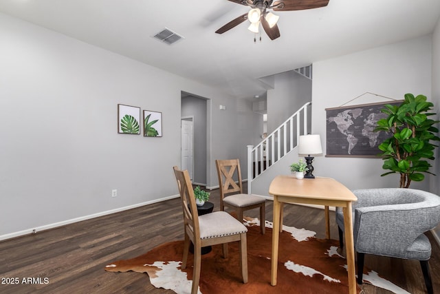 sitting room featuring ceiling fan and dark hardwood / wood-style floors