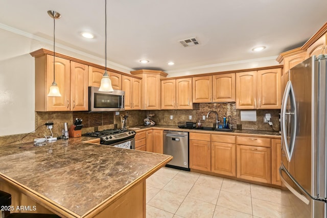 kitchen featuring sink, crown molding, hanging light fixtures, kitchen peninsula, and stainless steel appliances