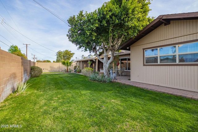 view of yard with a patio area