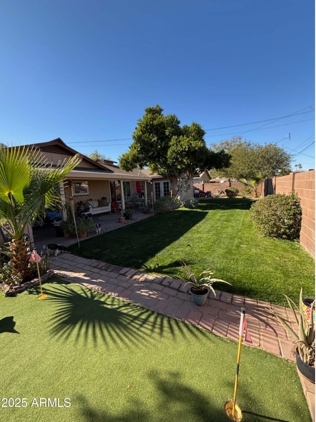 view of yard featuring a patio area