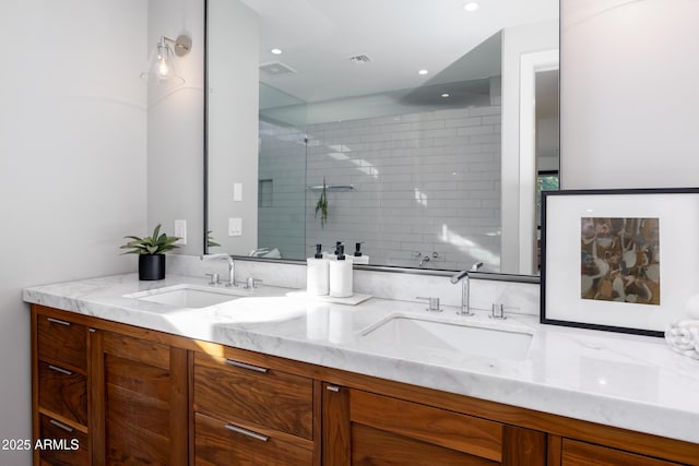 bathroom featuring vanity and walk in shower