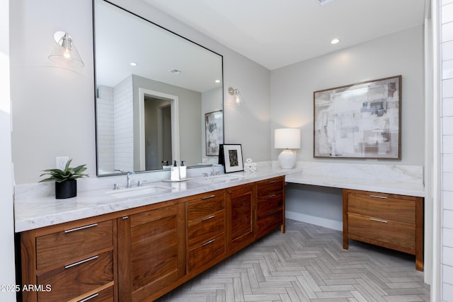 bathroom with vanity and parquet floors