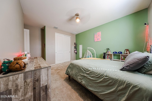 3907 S 75th Dr, Phoenix, AZ 85043 - carpeted bedroom with a ceiling fan, visible vents, and a closet