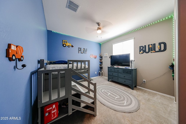 3907 S 75th Dr, Phoenix, AZ 85043 - bedroom with baseboards, visible vents, and carpet