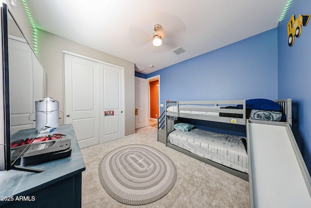 3907 S 75th Dr, Phoenix, AZ 85043 - bedroom with a ceiling fan, visible vents, a closet, and carpet flooring