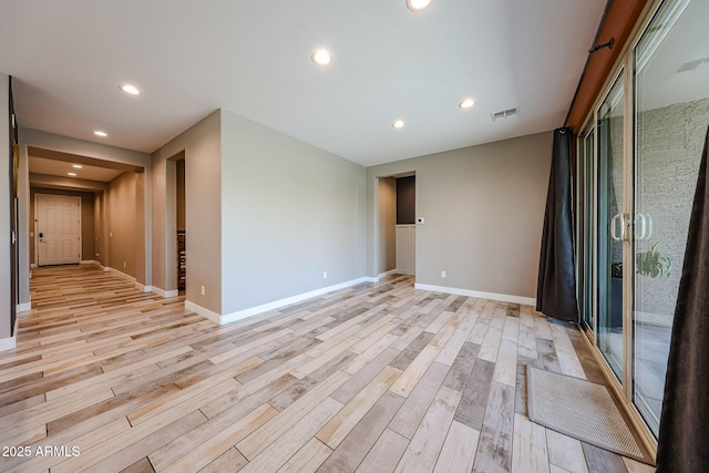 3907 S 75th Dr, Phoenix, AZ 85043 - spare room with baseboards, light wood-style floors, and recessed lighting