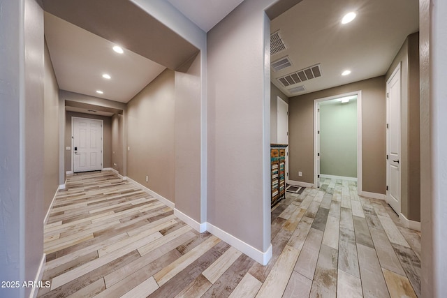 3907 S 75th Dr, Phoenix, AZ 85043 - corridor with baseboards, recessed lighting, visible vents, and light wood-type flooring