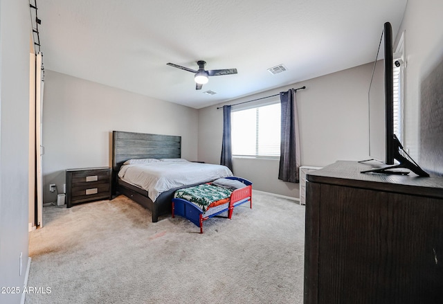 3907 S 75th Dr, Phoenix, AZ 85043 - bedroom with baseboards, visible vents, carpet floors, and ceiling fan
