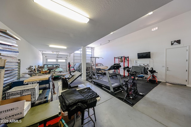 3907 S 75th Dr, Phoenix, AZ 85043 - exercise room featuring a textured ceiling