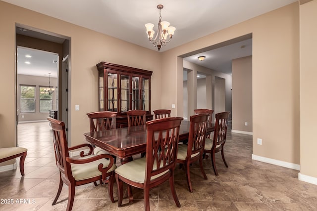 dining room with a chandelier