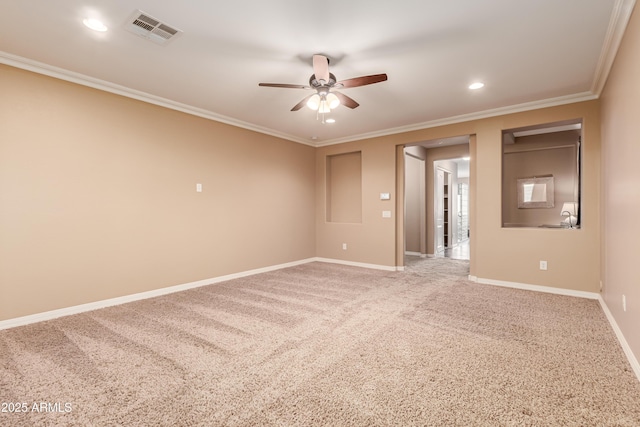 unfurnished room featuring carpet flooring, ceiling fan, and crown molding