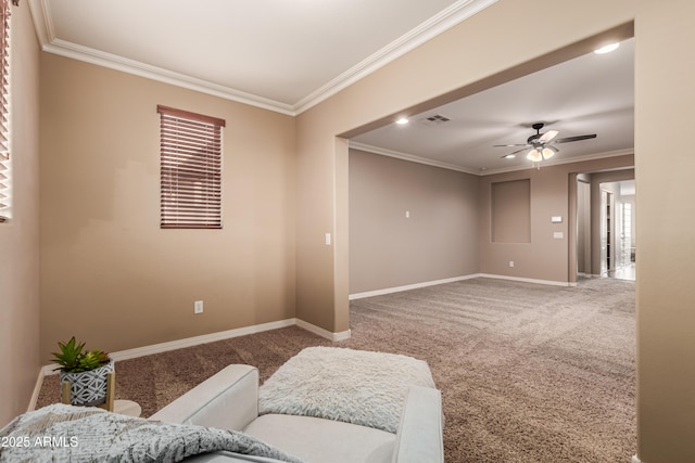 living room with carpet flooring, ceiling fan, and crown molding