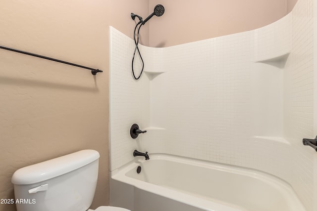 bathroom with toilet and shower / bathtub combination