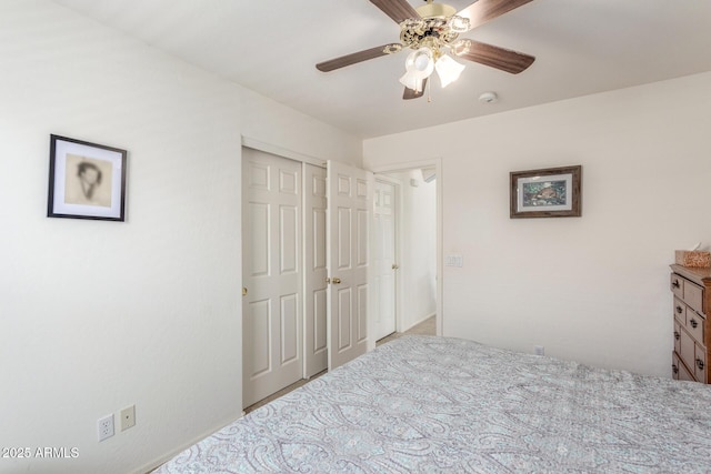 bedroom featuring a closet and a ceiling fan