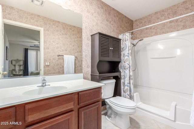 bathroom featuring tile patterned floors, toilet, wallpapered walls, a shower with curtain, and visible vents