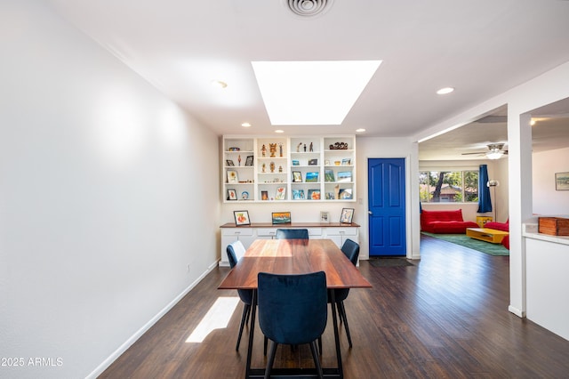 3465 N Jamison Blvd Unit 05, Flagstaff, AZ 86004 - dining space with dark wood-style flooring, recessed lighting, baseboards, and a skylight