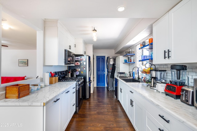 3465 N Jamison Blvd Unit 05, Flagstaff, AZ 86004 - kitchen with stainless steel appliances, a sink, white cabinetry, dark wood-style flooring, and recessed lighting