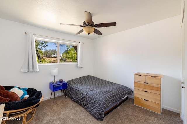 3465 N Jamison Blvd Unit 05, Flagstaff, AZ 86004 - carpeted bedroom with baseboards and ceiling fan