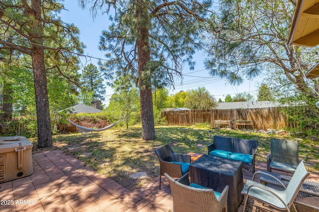 3465 N Jamison Blvd Unit 05, Flagstaff, AZ 86004 - wooden terrace with outdoor lounge area, a patio, and a fenced backyard
