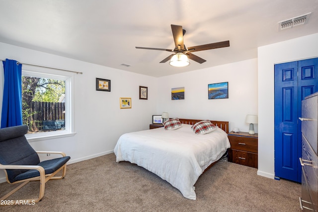 3465 N Jamison Blvd Unit 05, Flagstaff, AZ 86004 - carpeted bedroom with baseboards and a ceiling fan
