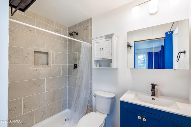 3465 N Jamison Blvd Unit 05, Flagstaff, AZ 86004 - bathroom featuring toilet, vanity, and tiled shower