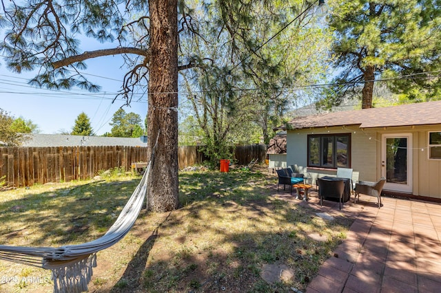 3465 N Jamison Blvd Unit 05, Flagstaff, AZ 86004 - fenced backyard with a patio area