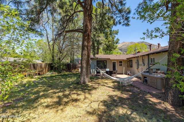 3465 N Jamison Blvd Unit 05, Flagstaff, AZ 86004 - fenced backyard featuring a deck with mountain view