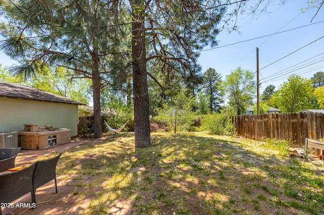 3465 N Jamison Blvd Unit 05, Flagstaff, AZ 86004 - view of yard with a patio and central air condition unit