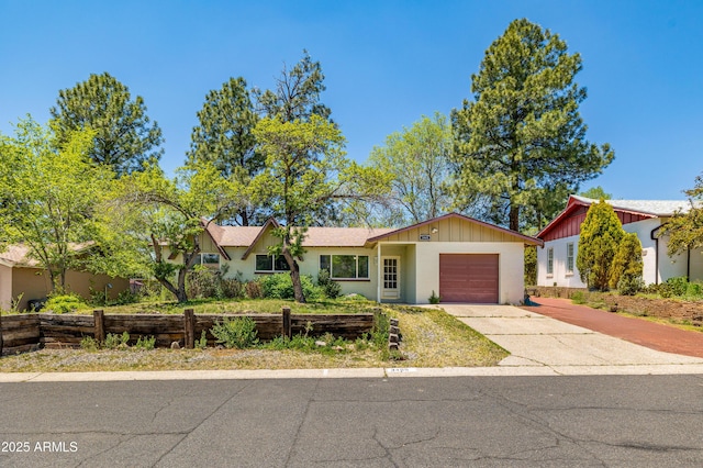 3465 N Jamison Blvd Unit 05, Flagstaff, AZ 86004 - view of front of house with a garage and concrete driveway