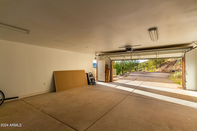 garage featuring a garage door opener